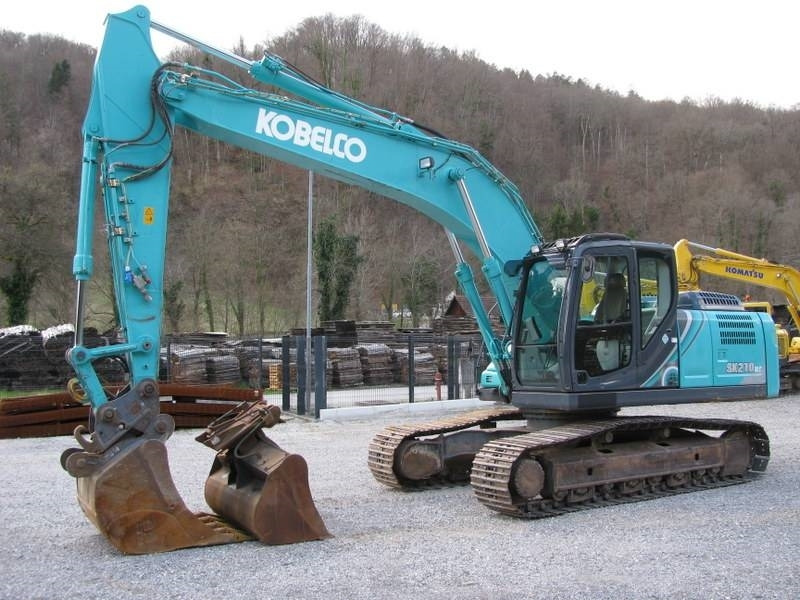 Kobelco SK210NLC-10 Vsa oprema TOP stanje - Escavadora de rastos: foto 1 Kobelco SK210NLC-10 Vsa oprema TOP stanje - Escavadora de rastos: foto 1