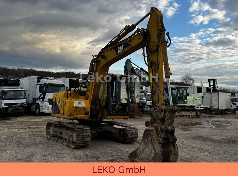 Caterpillar 311C Mit Zwei Löffeln - Escavadora de rastos: foto 1 Caterpillar 311C Mit Zwei Löffeln - Escavadora de rastos: foto 1