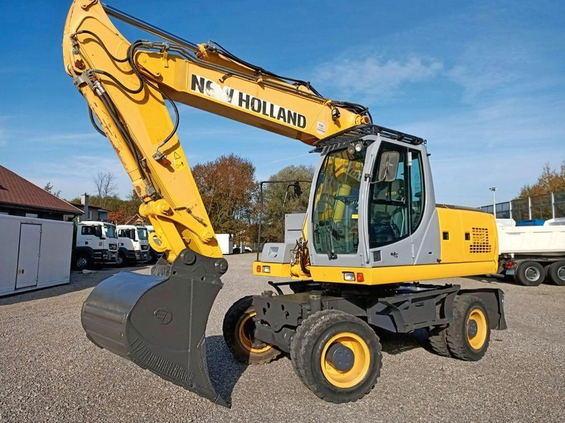 New Holland WE 190 - Escavadeira de rodas: foto 1 New Holland WE 190 - Escavadeira de rodas: foto 1