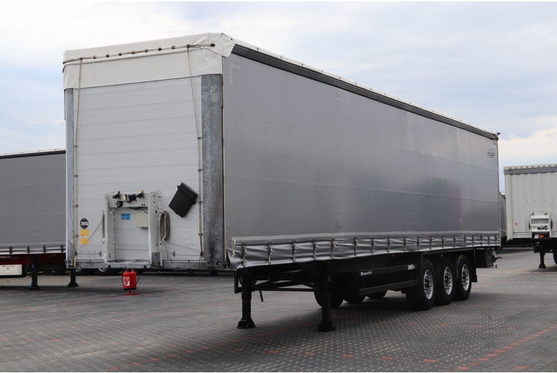 Schmitz Cargobull CURTAINSIDER / STANDARD / LIFTED AXLE / XL CODE / - Semi-reboque de lona: foto 1 Schmitz Cargobull CURTAINSIDER / STANDARD / LIFTED AXLE / XL CODE / - Semi-reboque de lona: foto 1