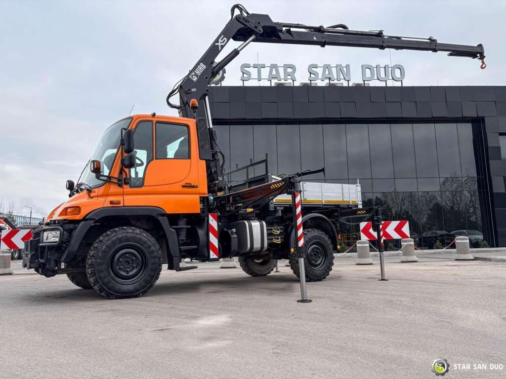 Unimog Mercedes-Benz UNIMOG U300 4x4 HIAB 122 D-3 CRANE Unimog Mercedes-Benz UNIMOG U300 4x4 HIAB 122 D-3 CRANE - Camião grua, Camião de caixa aberta/ Plataforma: foto 2 Unimog Mercedes-Benz UNIMOG U300 4x4 HIAB 122 D-3 CRANE Unimog Mercedes-Benz UNIMOG U300 4x4 HIAB 122 D-3 CRANE - Camião grua, Camião de caixa aberta/ Plataforma: foto 2