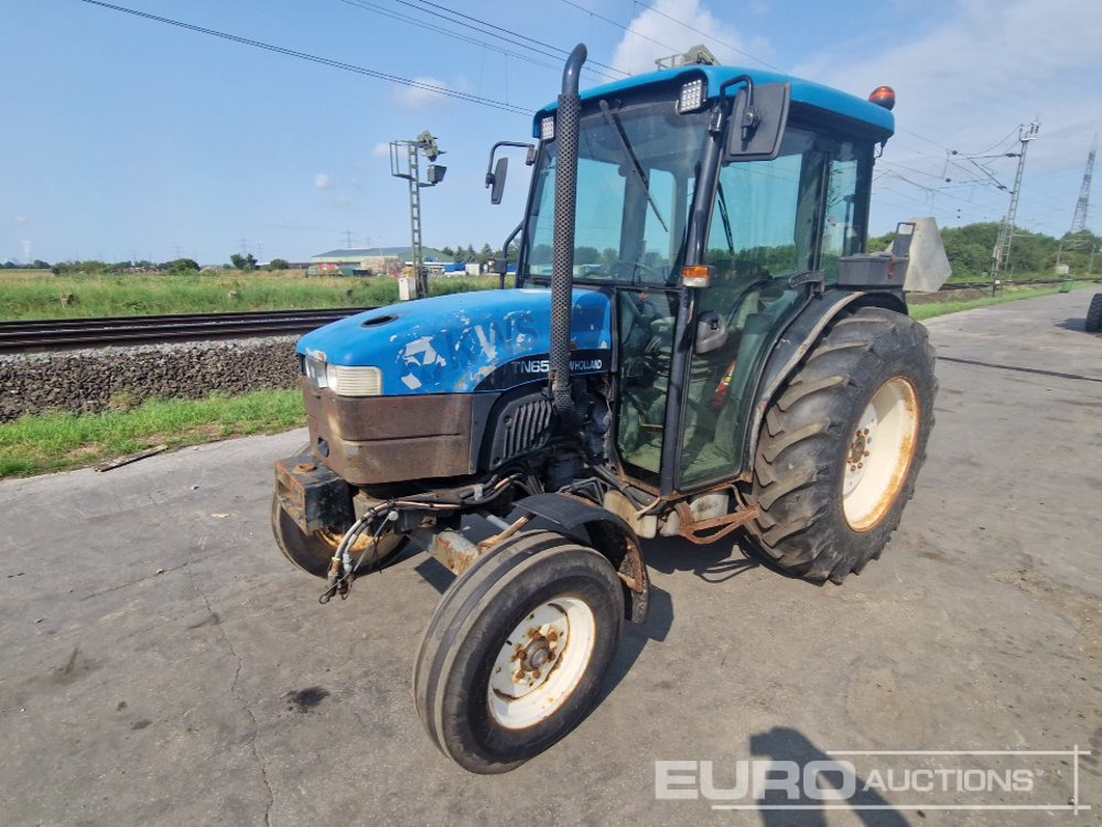 New Holland TN65D - Trator: foto 1 New Holland TN65D - Trator: foto 1
