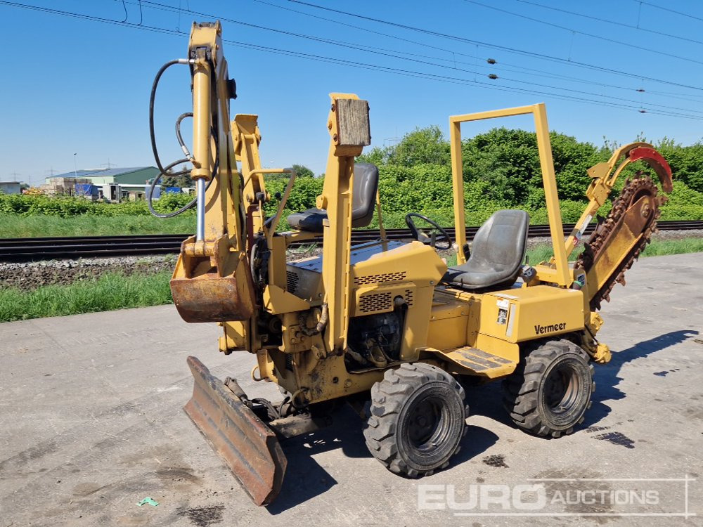 Vermeer 4WD Trencher, Blade, Front Hoe - Colocadora de tubagem: foto 1 Vermeer 4WD Trencher, Blade, Front Hoe - Colocadora de tubagem: foto 1