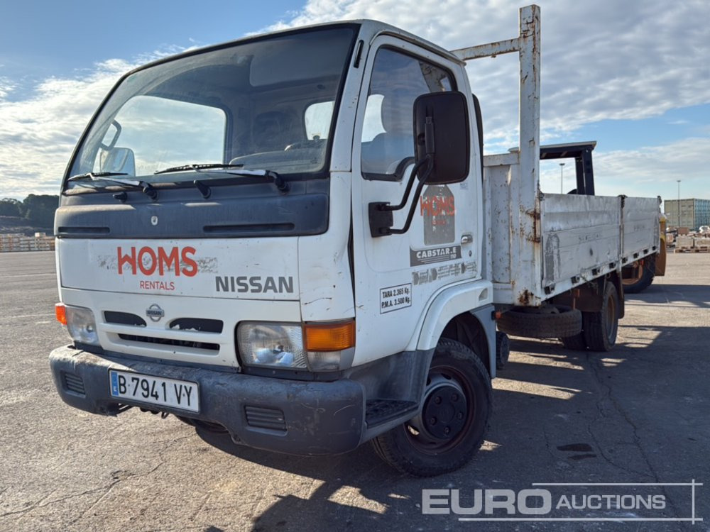 1999 Nissan Cabstar - Camião de caixa aberta/ Plataforma: foto 1 1999 Nissan Cabstar - Camião de caixa aberta/ Plataforma: foto 1