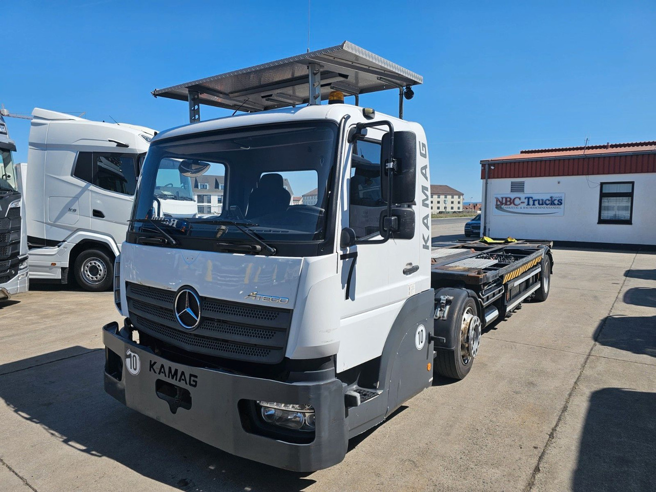 Mercedes-Benz KAMAG * WBH25 * UMSETZER * KLIMA * STANDHEIZ. * - Camião transportador de contêineres/ Caixa móvel: foto 1 Mercedes-Benz KAMAG * WBH25 * UMSETZER * KLIMA * STANDHEIZ. * - Camião transportador de contêineres/ Caixa móvel: foto 1