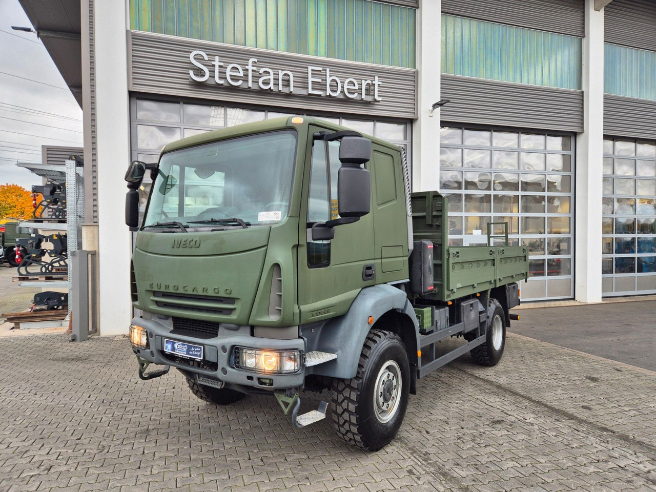 Iveco Eurocargo ML100E22WM-BW 4x4 Pritsche L-Haus Bett - Camião de caixa aberta/ Plataforma: foto 3 Iveco Eurocargo ML100E22WM-BW 4x4 Pritsche L-Haus Bett - Camião de caixa aberta/ Plataforma: foto 3