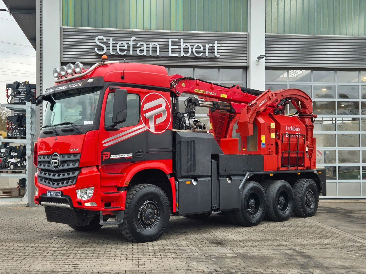 Mercedes-Benz TUROX 8x8 Eschlböck Biber 92 Holzhacker / 1.512h - Camião de transporte de madeira, Camião grua: foto 1 Mercedes-Benz TUROX 8x8 Eschlböck Biber 92 Holzhacker / 1.512h - Camião de transporte de madeira, Camião grua: foto 1