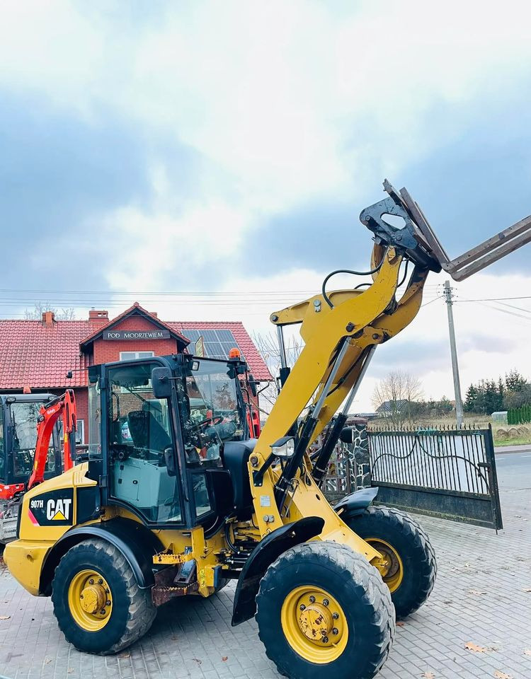 Pá carregadora de rodas Caterpillar 907H: foto 10