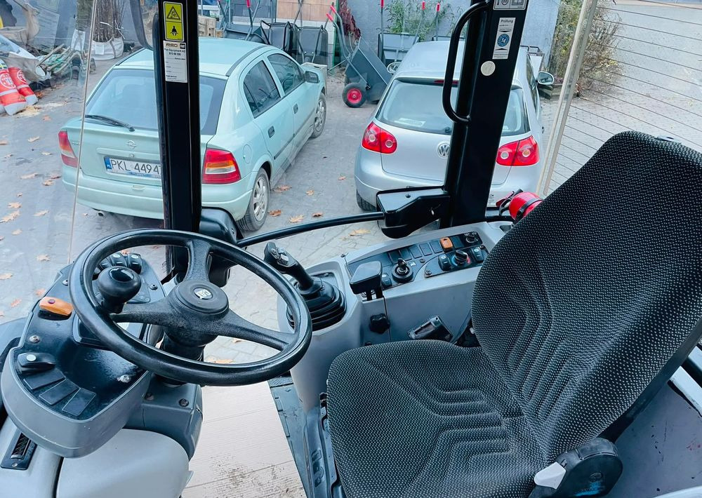 Pá carregadora de rodas Caterpillar 907H: foto 12
