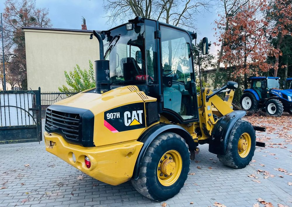 Pá carregadora de rodas Caterpillar 907H: foto 9