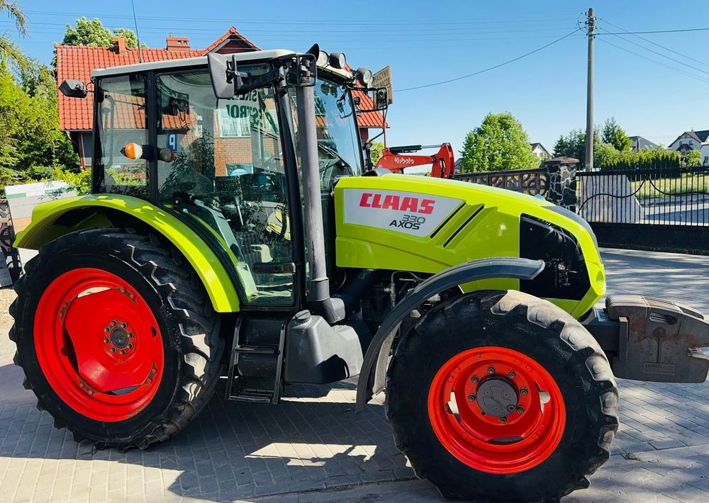 Claas Axos 330 - Trator: foto 1 Claas Axos 330 - Trator: foto 1