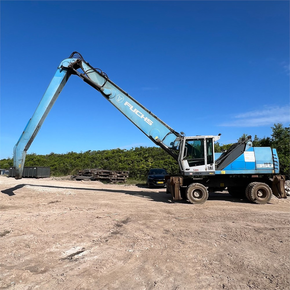 Fuchs MHL350 - Manipulador de material: foto 1 Fuchs MHL350 - Manipulador de material: foto 1