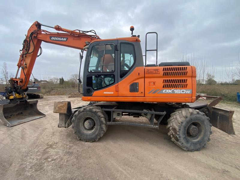Doosan DX 160W-3 - Escavadeira de rodas: foto 1 Doosan DX 160W-3 - Escavadeira de rodas: foto 1