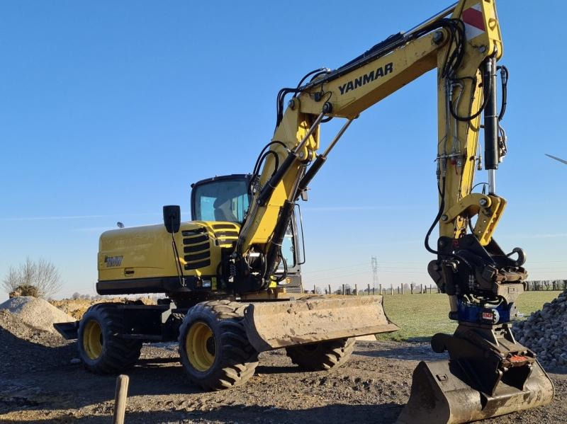 Yanmar B 110 W - Escavadeira de rodas: foto 1 Yanmar B 110 W - Escavadeira de rodas: foto 1
