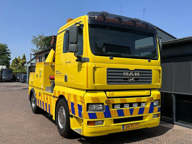 MAN TGA 18.360 Takelwagen Palfinger Kraan Falkom Brill - Caminhão reboque: foto 1 MAN TGA 18.360 Takelwagen Palfinger Kraan Falkom Brill - Caminhão reboque: foto 1