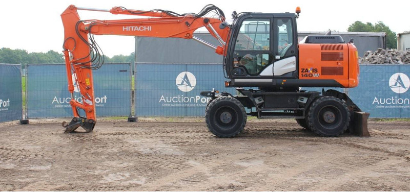 Hitachi ZX140W-5B - Escavadeira de rodas: foto 2 Hitachi ZX140W-5B - Escavadeira de rodas: foto 2