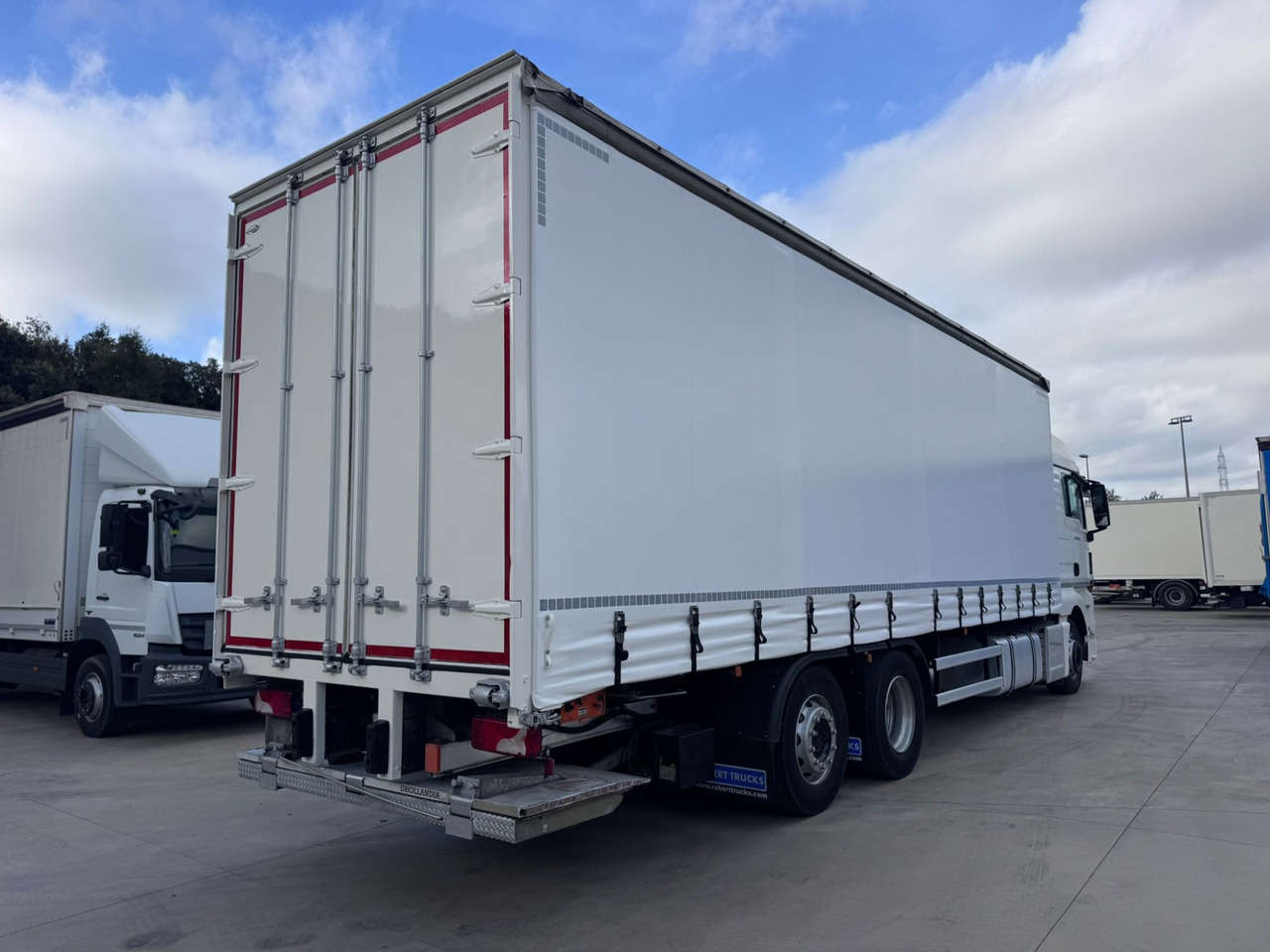MAN 26.360 L TGX E6 (Tauliner) - Camião de lona: foto 4 MAN 26.360 L TGX E6 (Tauliner) - Camião de lona: foto 4