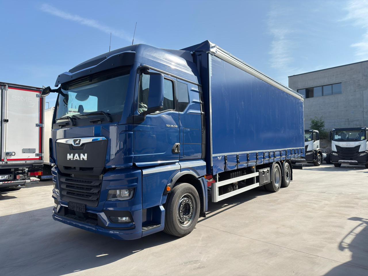MAN 26.510 TGX E6 (Tauliner) - Camião de lona: foto 1 MAN 26.510 TGX E6 (Tauliner) - Camião de lona: foto 1