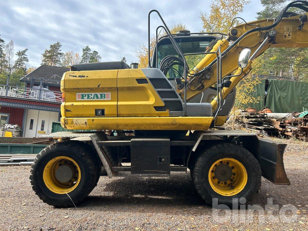 New Holland MH 4.6 - Escavadeira de rodas: foto 5 New Holland MH 4.6 - Escavadeira de rodas: foto 5