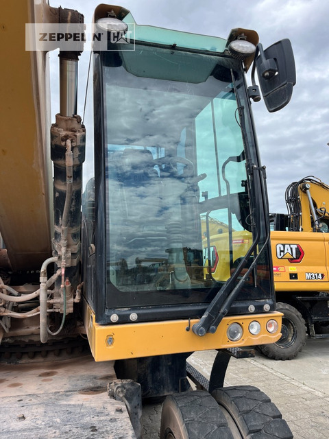 Manipulador de material Cat MH3024-06C: foto 8