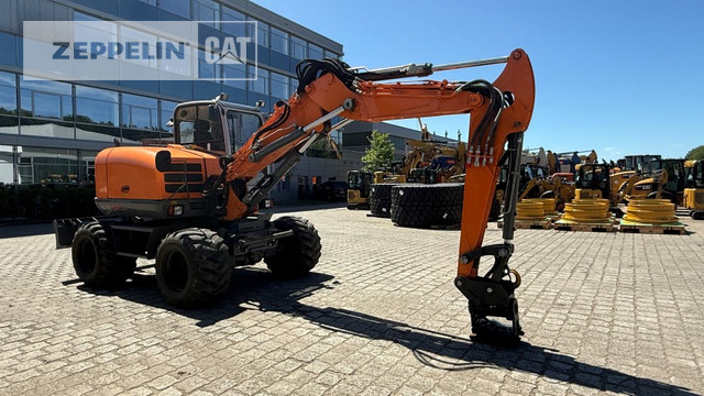 Wacker EW100 - Escavadeira de rodas: foto 1 Wacker EW100 - Escavadeira de rodas: foto 1