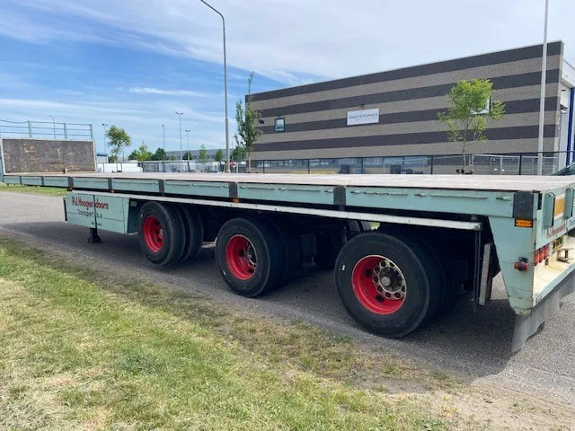 Floor robuuste vlakke oplegger ,uitschuifbaar, ,stuurassen, 20 mtr met stalen bodem/frame. kranenprofiel. - Semi-reboque plataforma/ Caixa aberta: foto 5 Floor robuuste vlakke oplegger ,uitschuifbaar, ,stuurassen, 20 mtr met stalen bodem/frame. kranenprofiel. - Semi-reboque plataforma/ Caixa aberta: foto 5