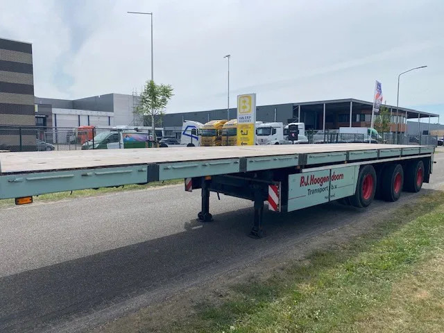 Floor robuuste vlakke oplegger ,uitschuifbaar, ,stuurassen, 20 mtr met stalen bodem/frame. kranenprofiel. - Semi-reboque plataforma/ Caixa aberta: foto 3 Floor robuuste vlakke oplegger ,uitschuifbaar, ,stuurassen, 20 mtr met stalen bodem/frame. kranenprofiel. - Semi-reboque plataforma/ Caixa aberta: foto 3