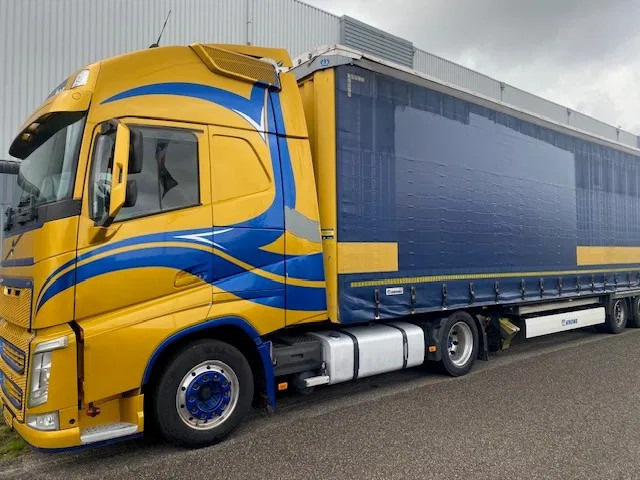 Volvo FH 13.460 "low deck" trekker, met volume oplegger Krone 102 cub. - Tractor: foto 1 Volvo FH 13.460 "low deck" trekker, met volume oplegger Krone 102 cub. - Tractor: foto 1